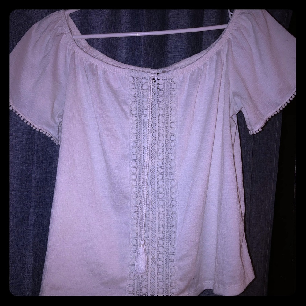 White cold shoulder crop top.